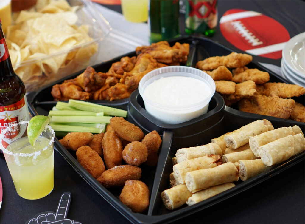 Platter of Game Day snacks with beer and margaritas